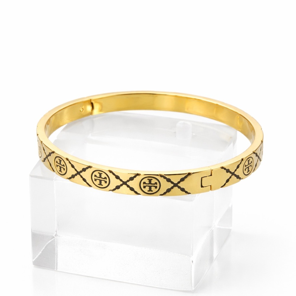 Tory Burch Monogram enamel miller stud hinge bracelet in black and gold tone. - Picture 4 of 7